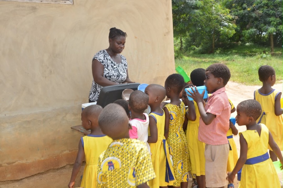 Students receiving food at school